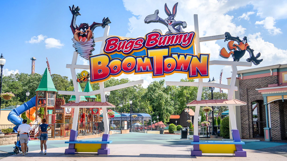 Bugs Bunny BoomTown entrance at Six Flags Over Georgia with colorful play structures.