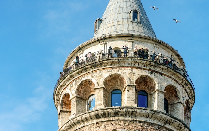 Aerial view of Galata Tower with visitors on the observation deck, Istanbul.