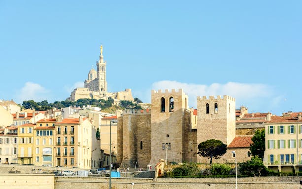 Abbey of Saint Victor with Notre-Dame de la Garde in background, Marseille, France.
