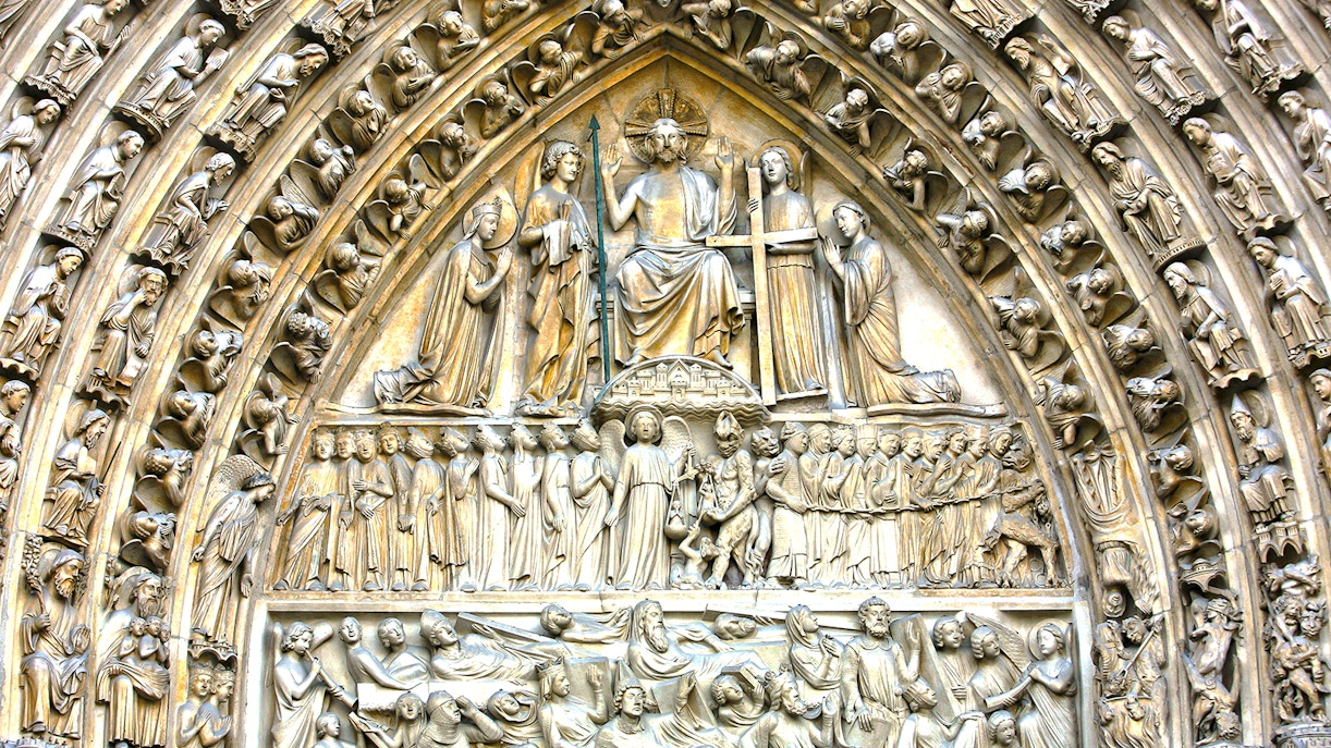 Notre-Dame Last Judgment sculpture detail in Paris, France.
