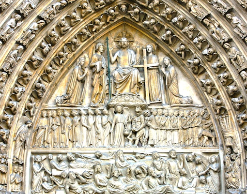Notre-Dame Last Judgment sculpture detail in Paris, France.
