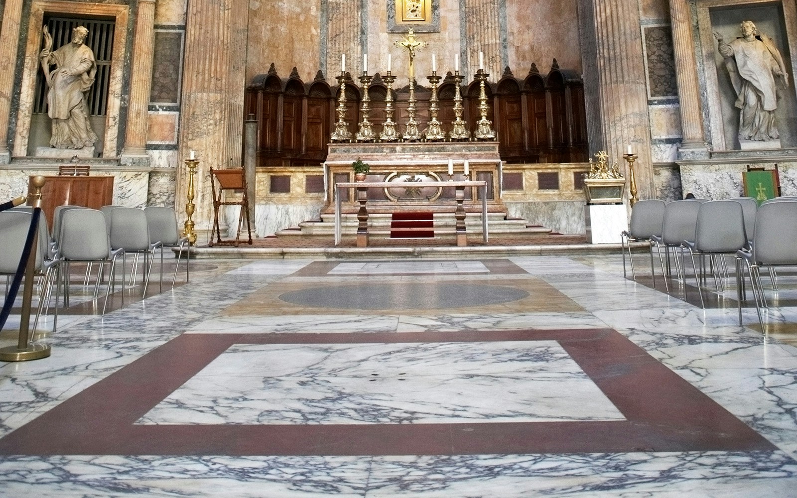 Pantheon interior with marble floors and altar, Rome.