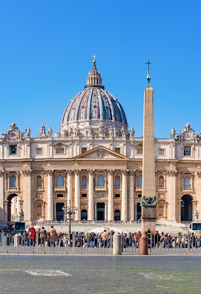 St Peter's Basilica facade with obelisk in Vatican City, Rome.