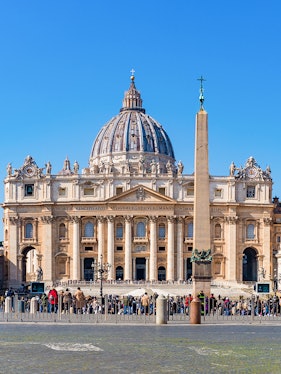 St Peter's Basilica facade with obelisk in Vatican City, Rome.