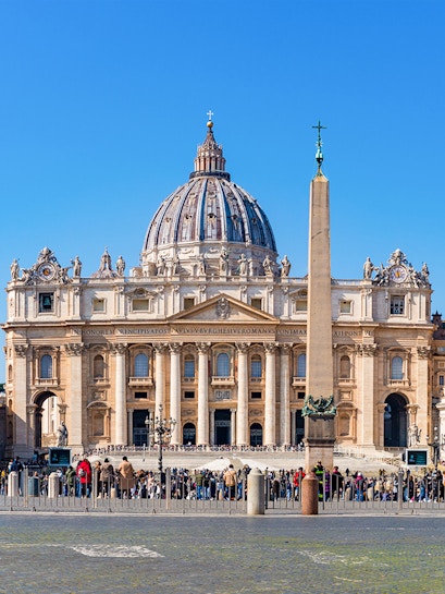 St Peter's Basilica facade with obelisk in Vatican City, Rome.