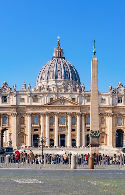 St Peter's Basilica facade with obelisk in Vatican City, Rome.