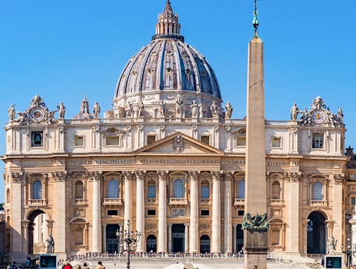 St Peter's Basilica facade with obelisk in Vatican City, Rome.