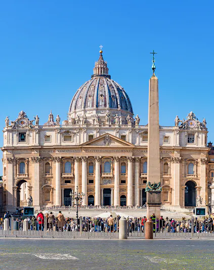 St Peter's Basilica facade with obelisk in Vatican City, Rome.