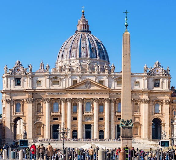 St Peter's Basilica facade with obelisk in Vatican City, Rome.