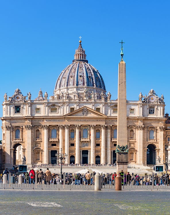 St Peter's Basilica facade with obelisk in Vatican City, Rome.