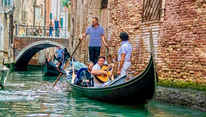 Gondola with musician in grand Canal, Venice