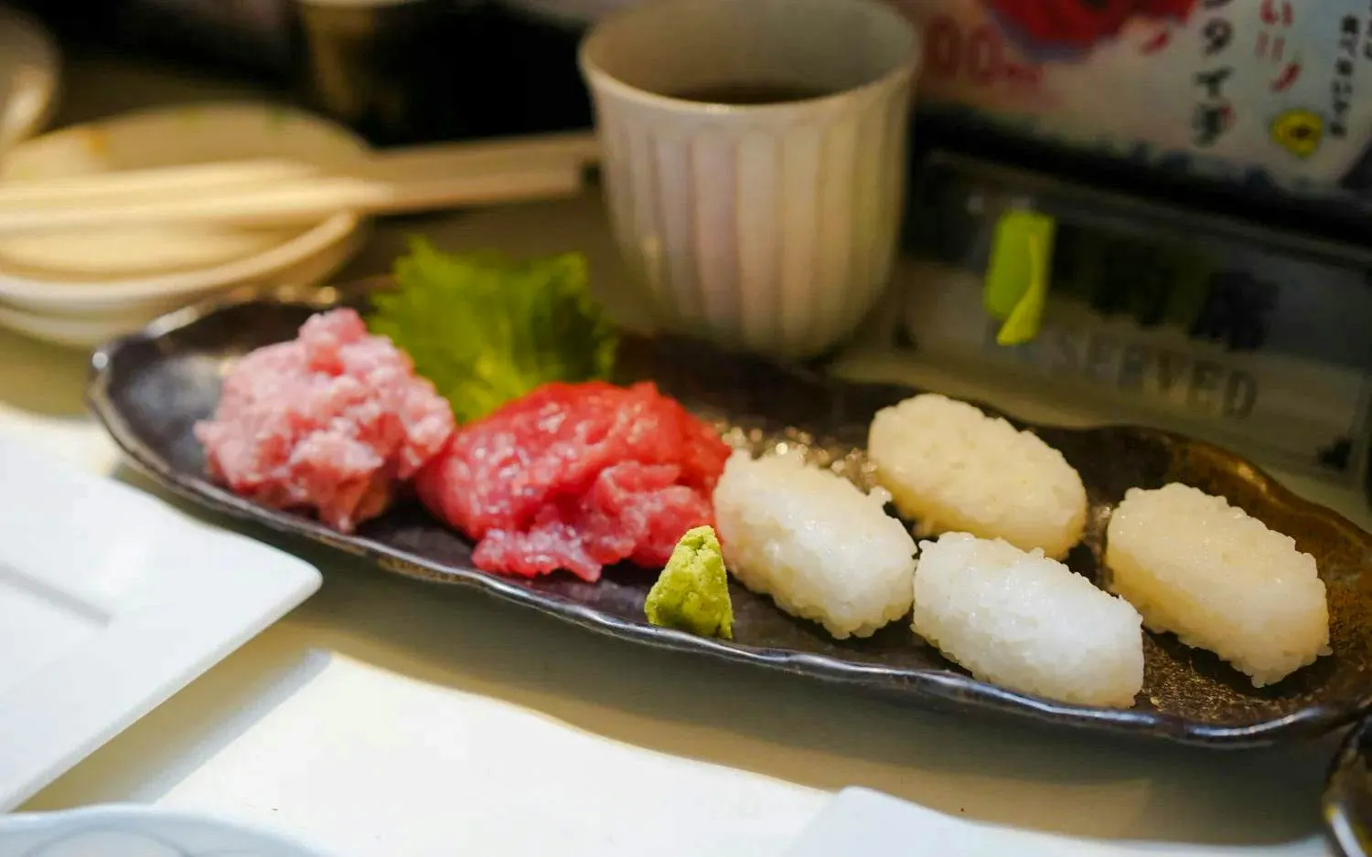 Sushi platter with tuna and rice at Tsukiji Fish Market, Tokyo.