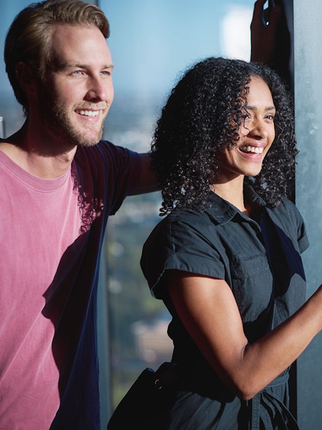 Visitors enjoying the view from Melbourne Skydeck during the Ultimate Skydeck Experience.
