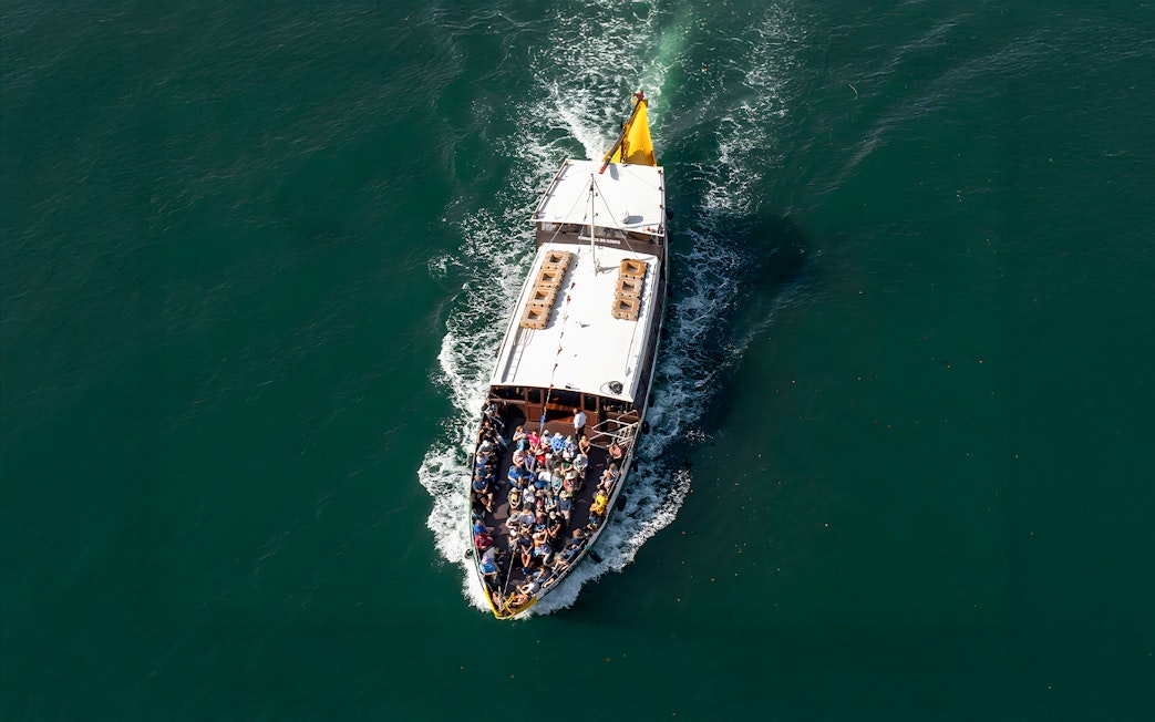 Tourists on a boat during a Porto walking tour cruise trip.
