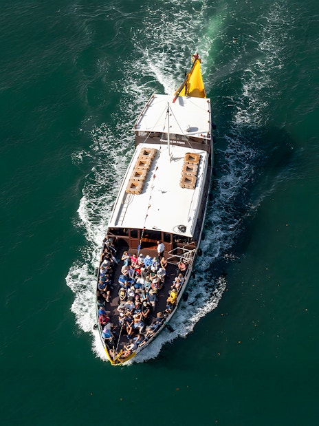 Tourists on a boat during a Porto walking tour cruise trip.