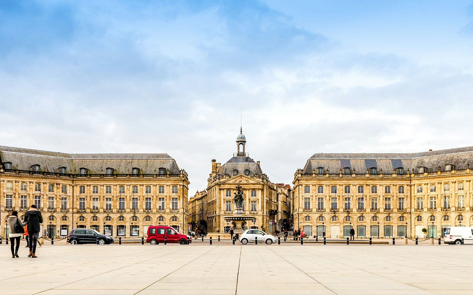 Place de la Bourse in Bordeaux with classical architecture and central fountain.
