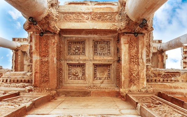 Library of Celsus column details, Ephesus, Turkey, showcasing intricate carvings.