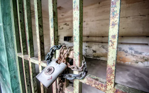Locked cell door at Penang War Museum, Malaysia.