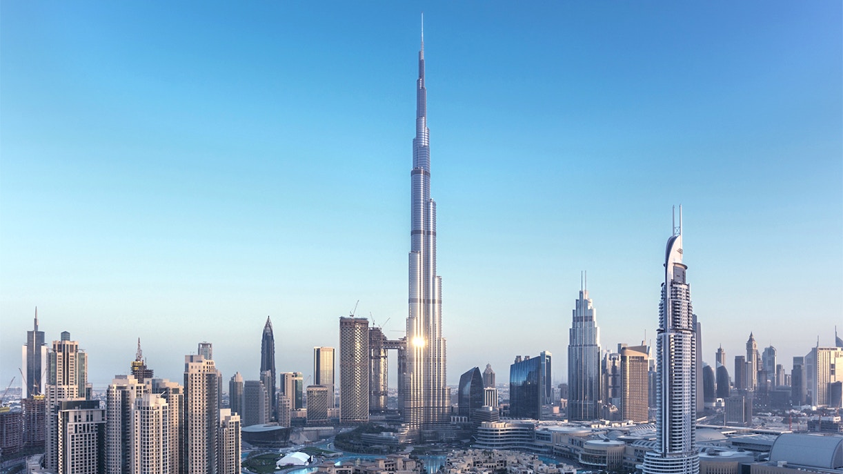 Aerial view of Burj Khalifa in Dubai with surrounding cityscape.