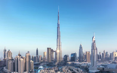 Aerial view of Burj Khalifa in Dubai with surrounding cityscape.