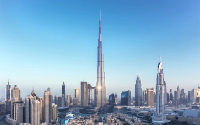 Aerial view of Burj Khalifa in Dubai with surrounding cityscape.
