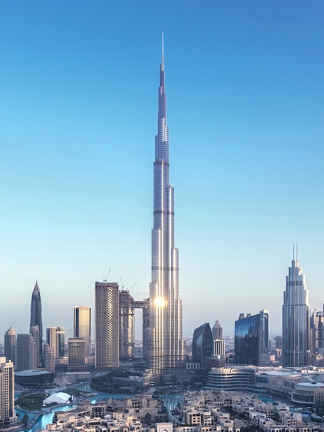 Aerial view of Burj Khalifa in Dubai with surrounding cityscape.