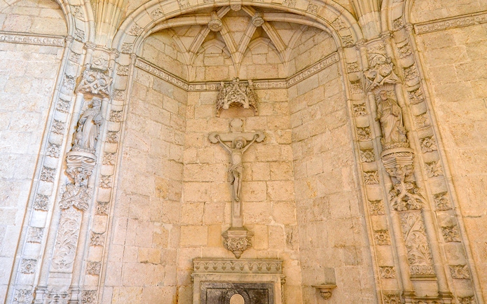 Jerónimos Monastery interior stone carvings and crucifix detail, Lisbon.