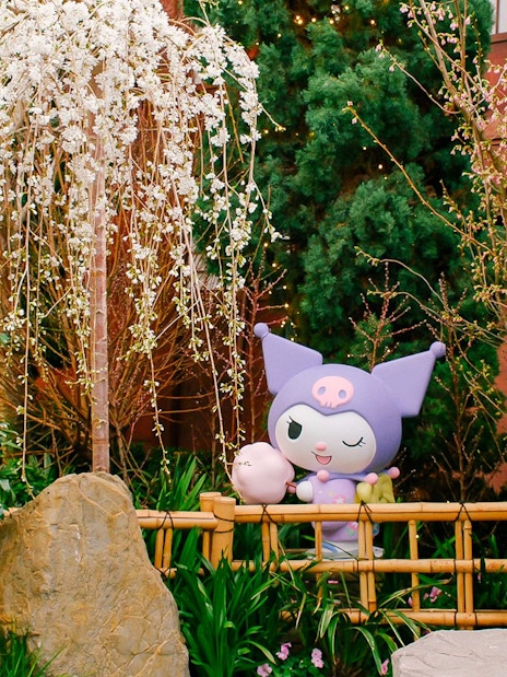 Kuromi character among cherry blossoms at Gardens by the Bay Sakura event.