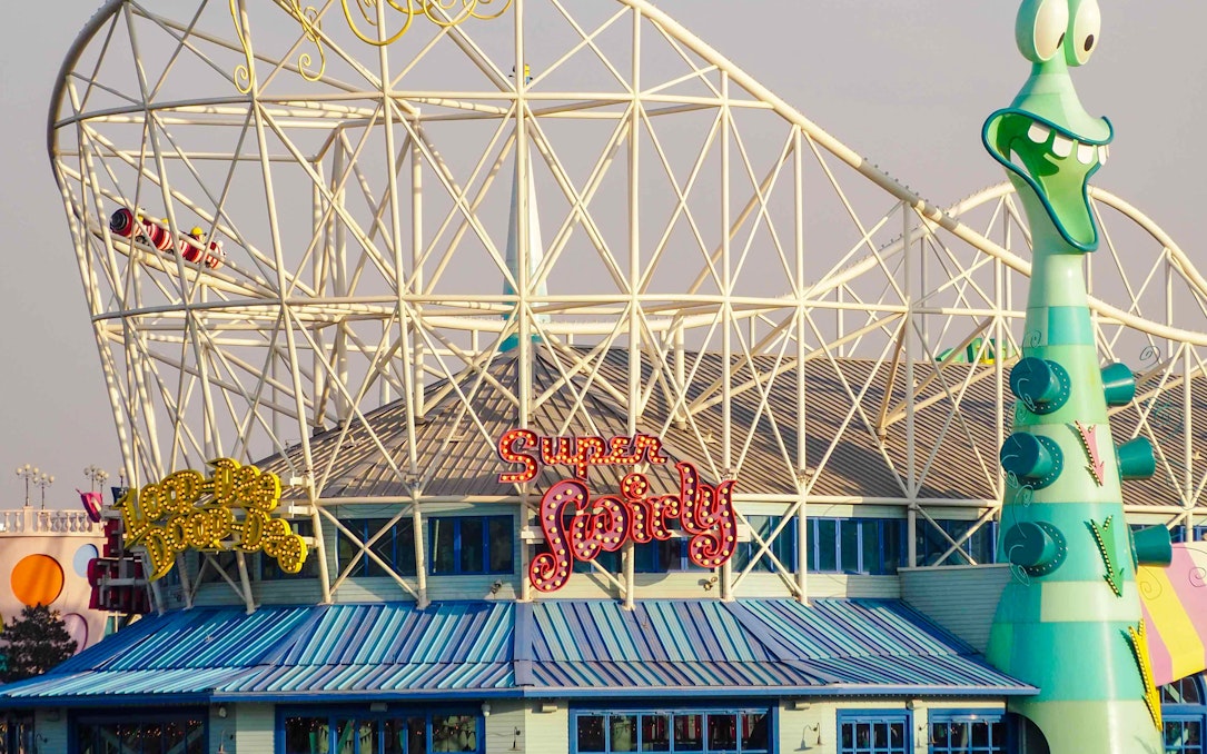 Roller coaster and whimsical architecture at Universal Studios Beijing.