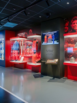 Rafa Nadal Museum interior with tennis memorabilia and display cases.