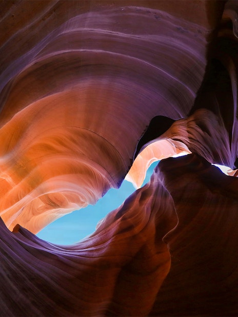 Antelope Canyon X rock formations with sunlight filtering through, Arizona.