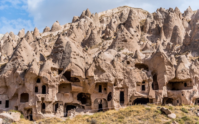 Rock formations and ancient cave dwellings at Zelve Open Air Museum, Cappadocia, Turkey.