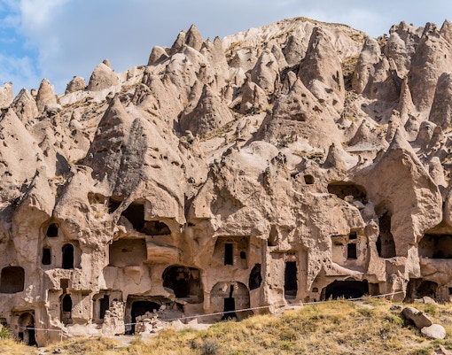 Rock formations and ancient cave dwellings at Zelve Open Air Museum, Cappadocia, Turkey.