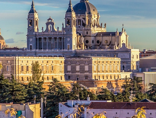 Royal Collections Gallery with Almudena Cathedral in Madrid skyline.