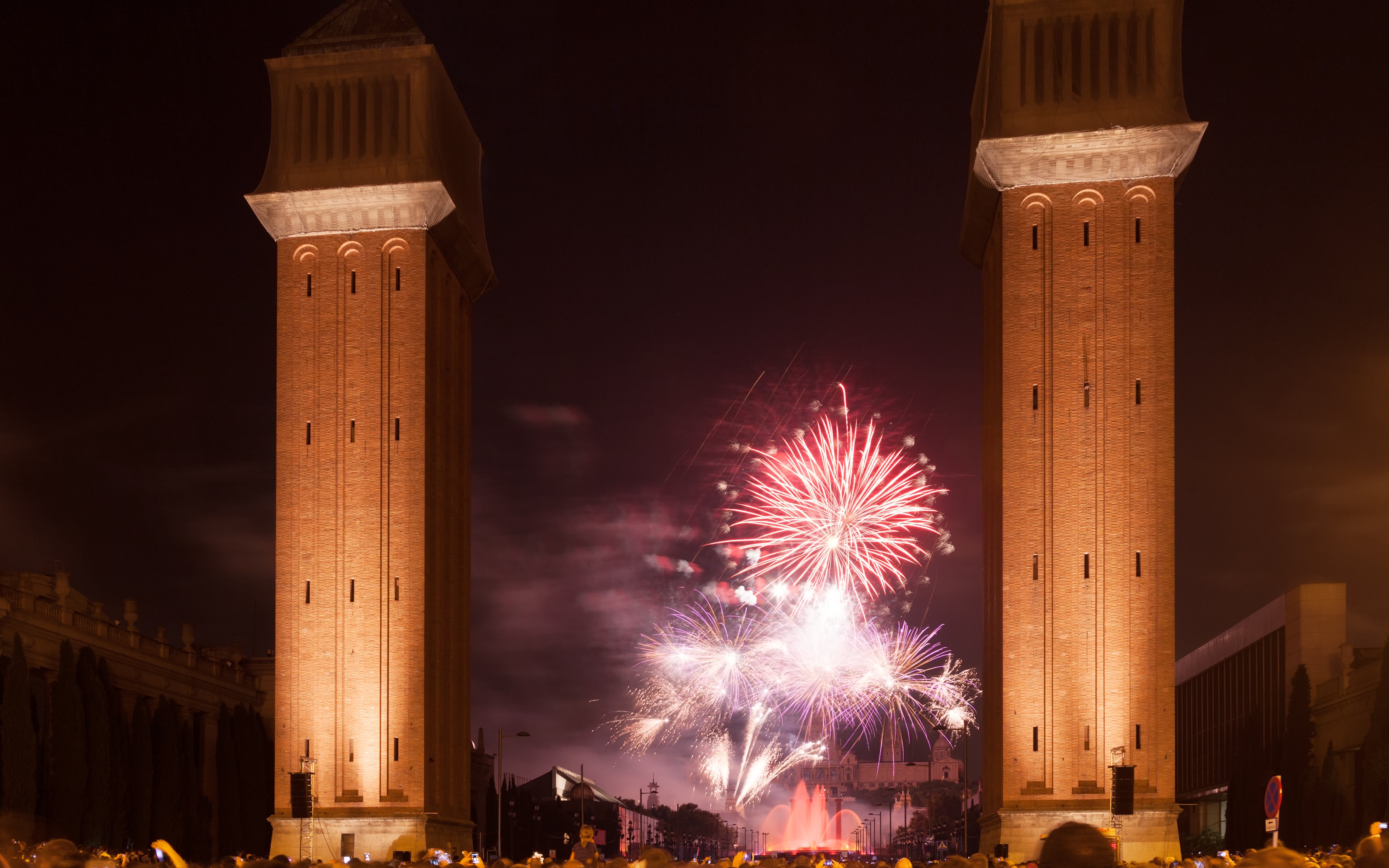 Fireworks at La Merce Festival between Venetian Towers, Barcelona, Spain.