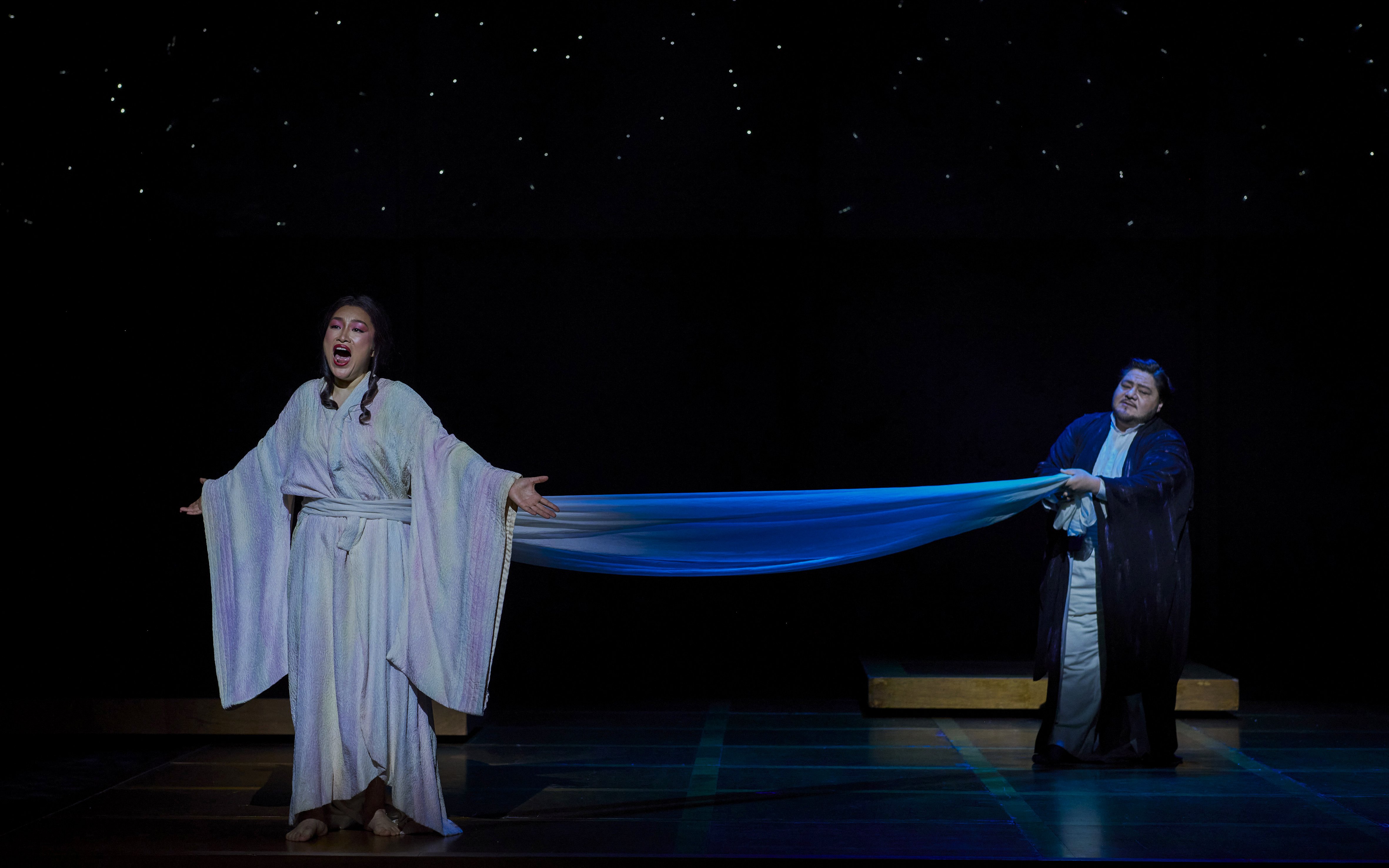 Stage performance of Madama Butterfly in Sydney with two performers in traditional costumes.