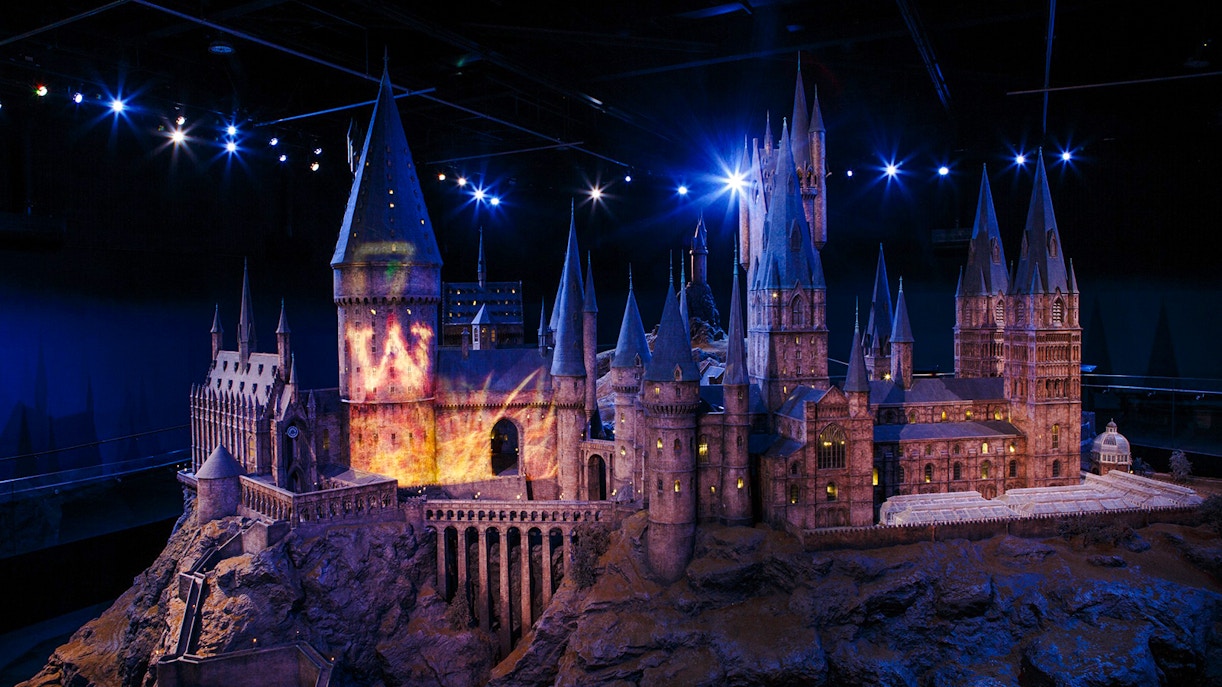 Hogwarts Castle model illuminated at Harry Potter Warner Bros. Studio Tour, London.