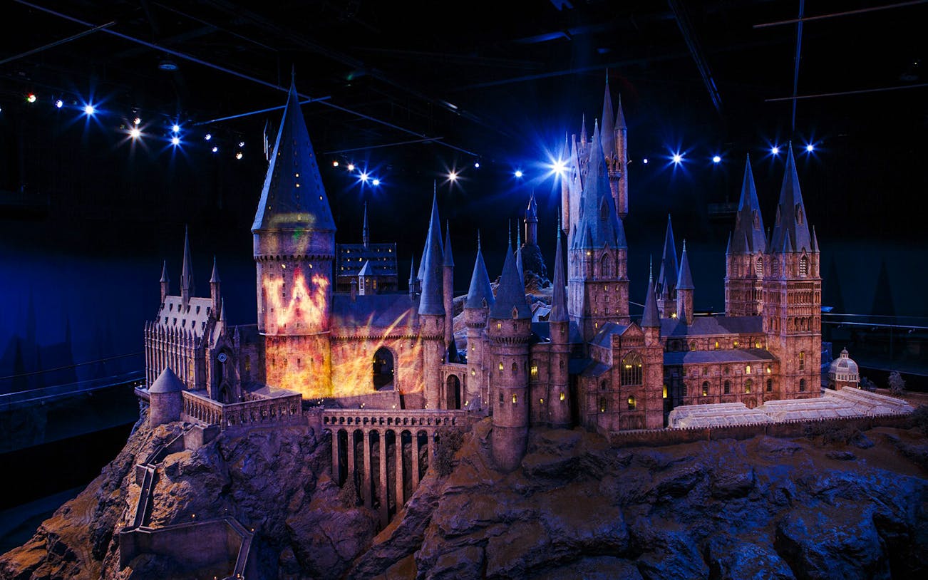 Hogwarts Castle model illuminated at Harry Potter Warner Bros. Studio Tour, London.