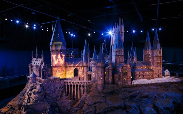 Hogwarts Castle model illuminated at Harry Potter Warner Bros. Studio Tour, London.