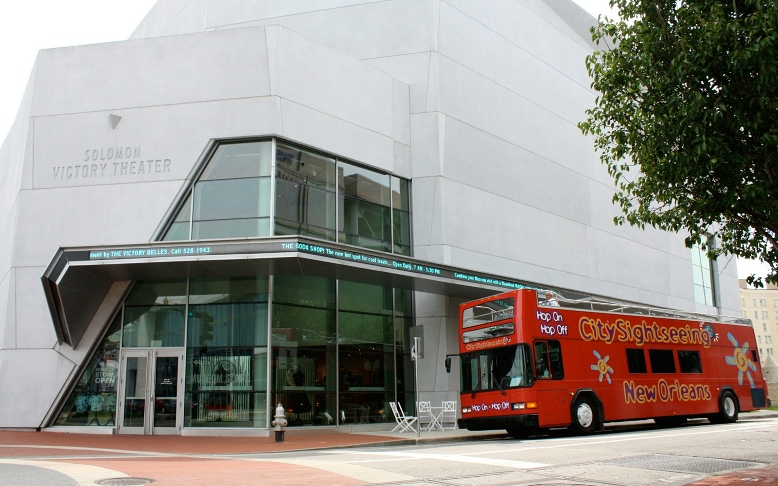 Tourists enjoying the National WWII Museum Hop-On Hop-Off Bus Tour in New Orleans