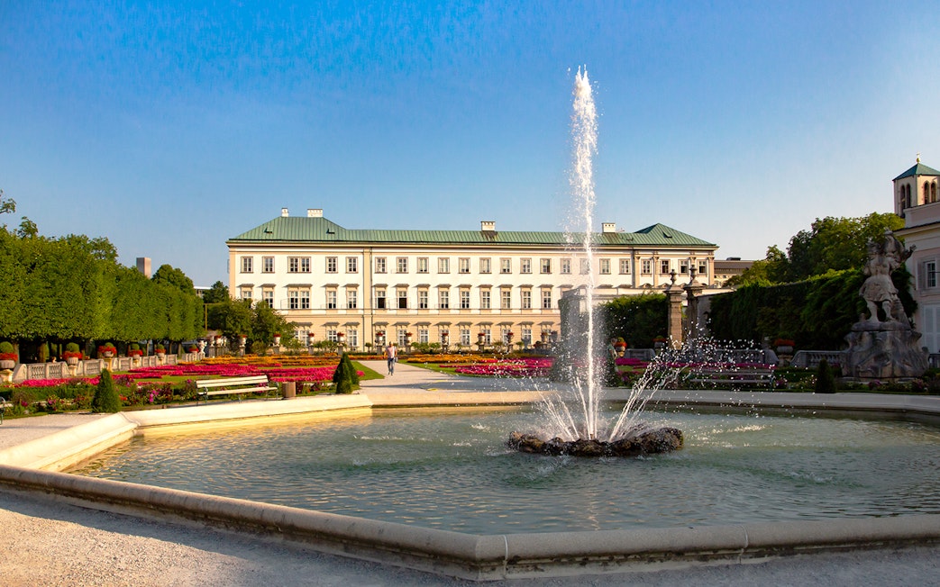 Mirabell Palace gardens with fountain in Salzburg, featured in the Original Sound of Music Tour.