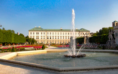 Mirabell Palace gardens with fountain in Salzburg, featured in the Original Sound of Music Tour.