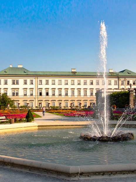 Mirabell Palace gardens with fountain in Salzburg, featured in the Original Sound of Music Tour.