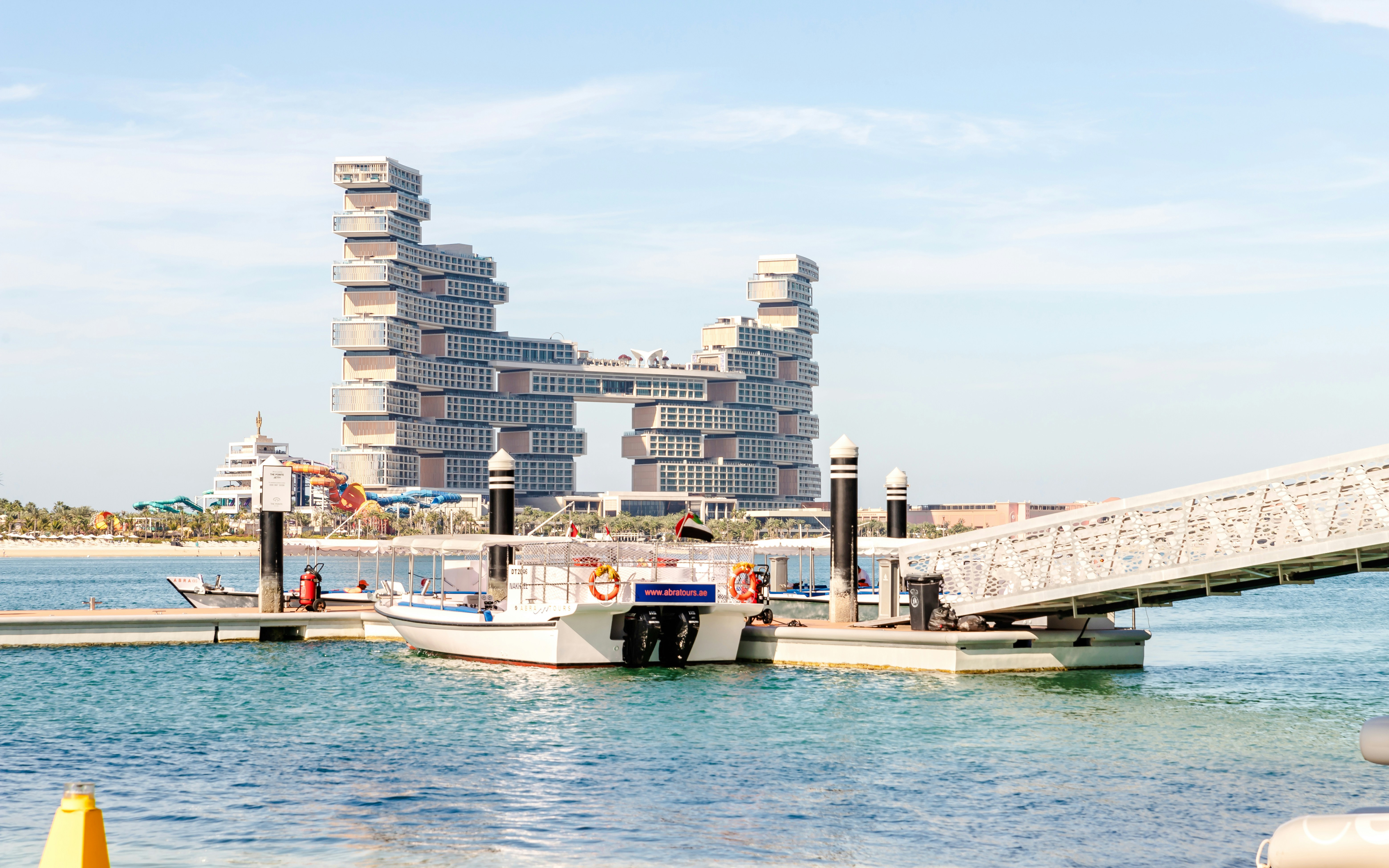 Boats docked near Atlantis The Royal Hotel on Palm Jumeirah, Dubai.