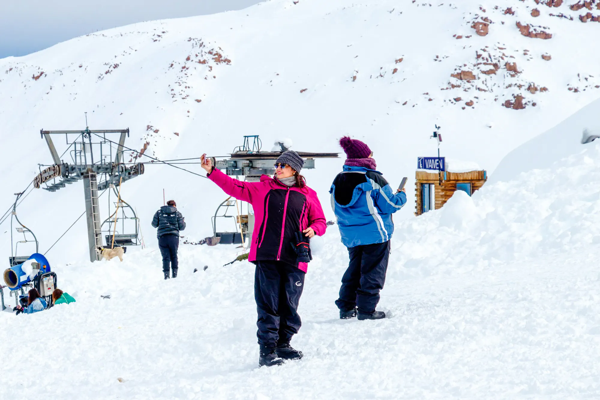Visitors taking photos at Valle Nevado ski resort, Santiago.