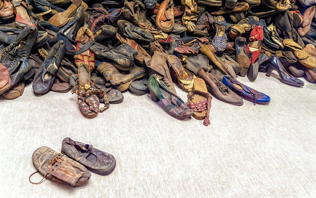 Shoes from Holocaust victims at Auschwitz Birkenau Memorial Museum exhibit.