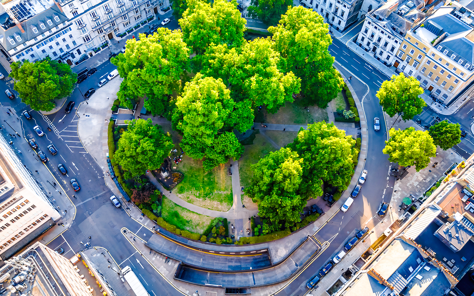 Aerial view of Cavendish Square Gardens in London surrounded by roads and buildings.
