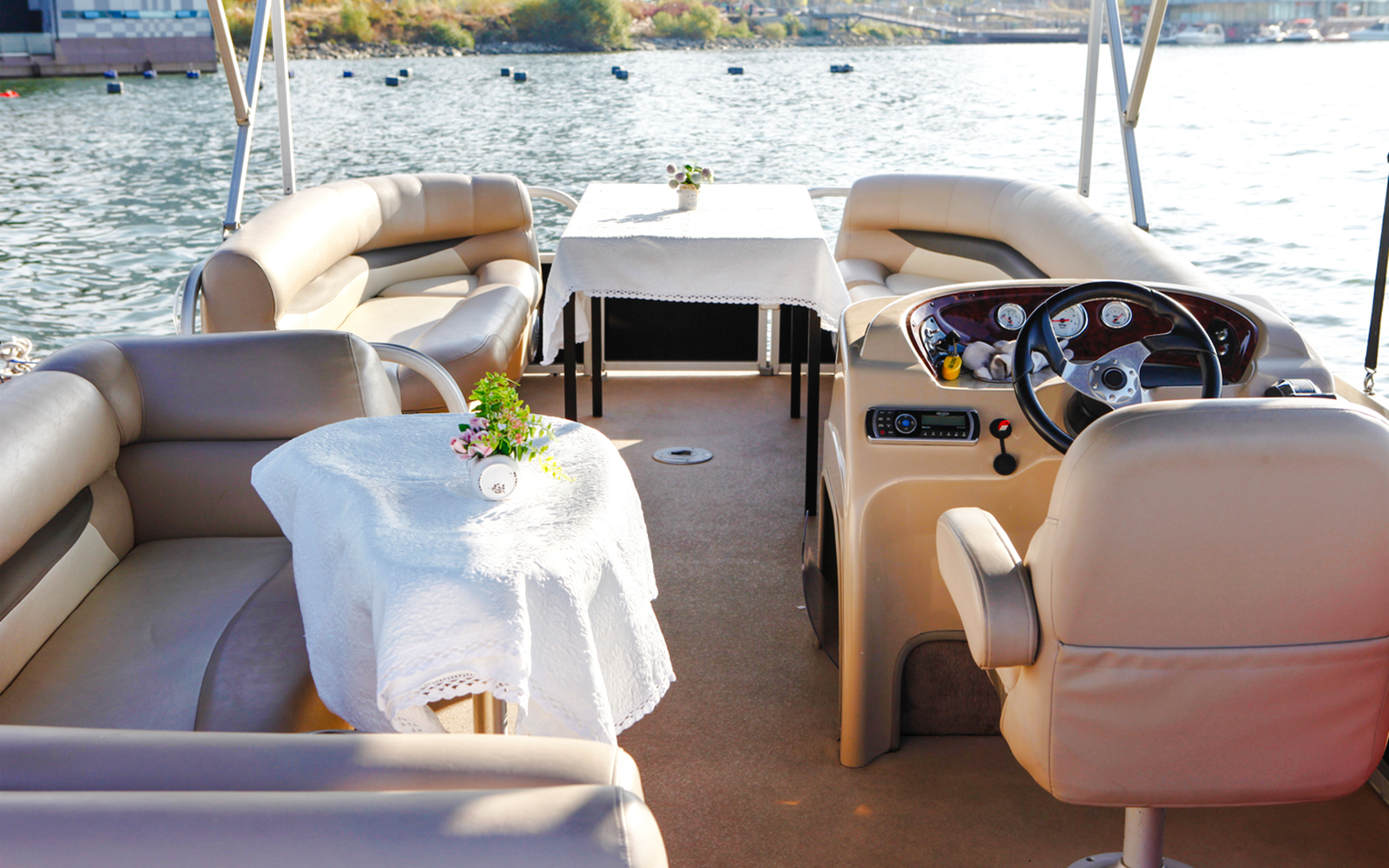 Yacht interior with seating and table on Han River cruise, Seoul.