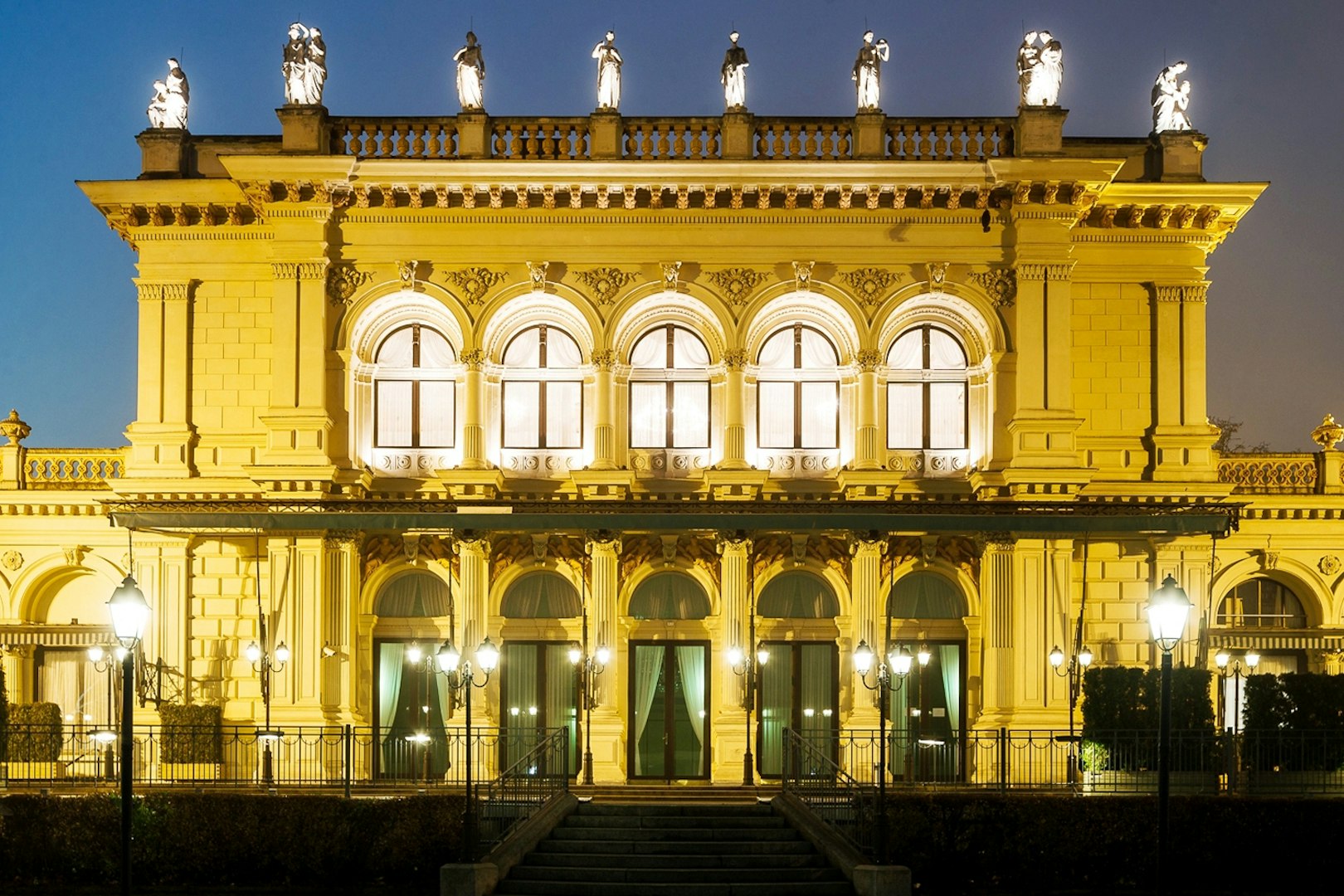 Kursalon Vienna illuminated at night, venue for Mozart and Strauss concert with dinner.