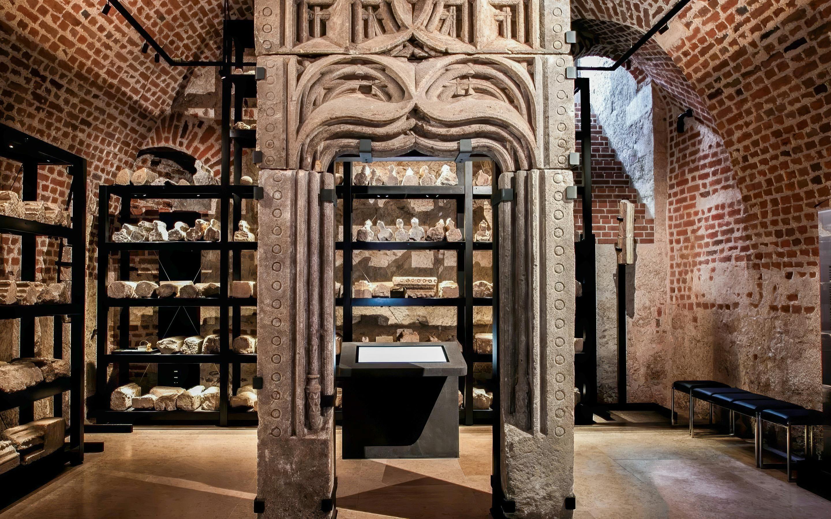 Wawel Castle underground chamber with stone artifacts, Kraków, Poland.